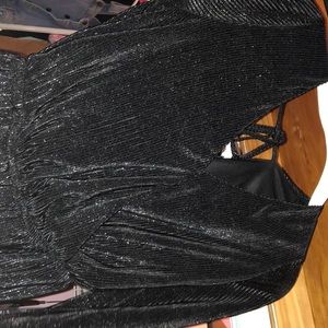 Elegant Romper-black but has silver sparkles.